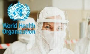WHO-Logo und Pandemie-Kleidung